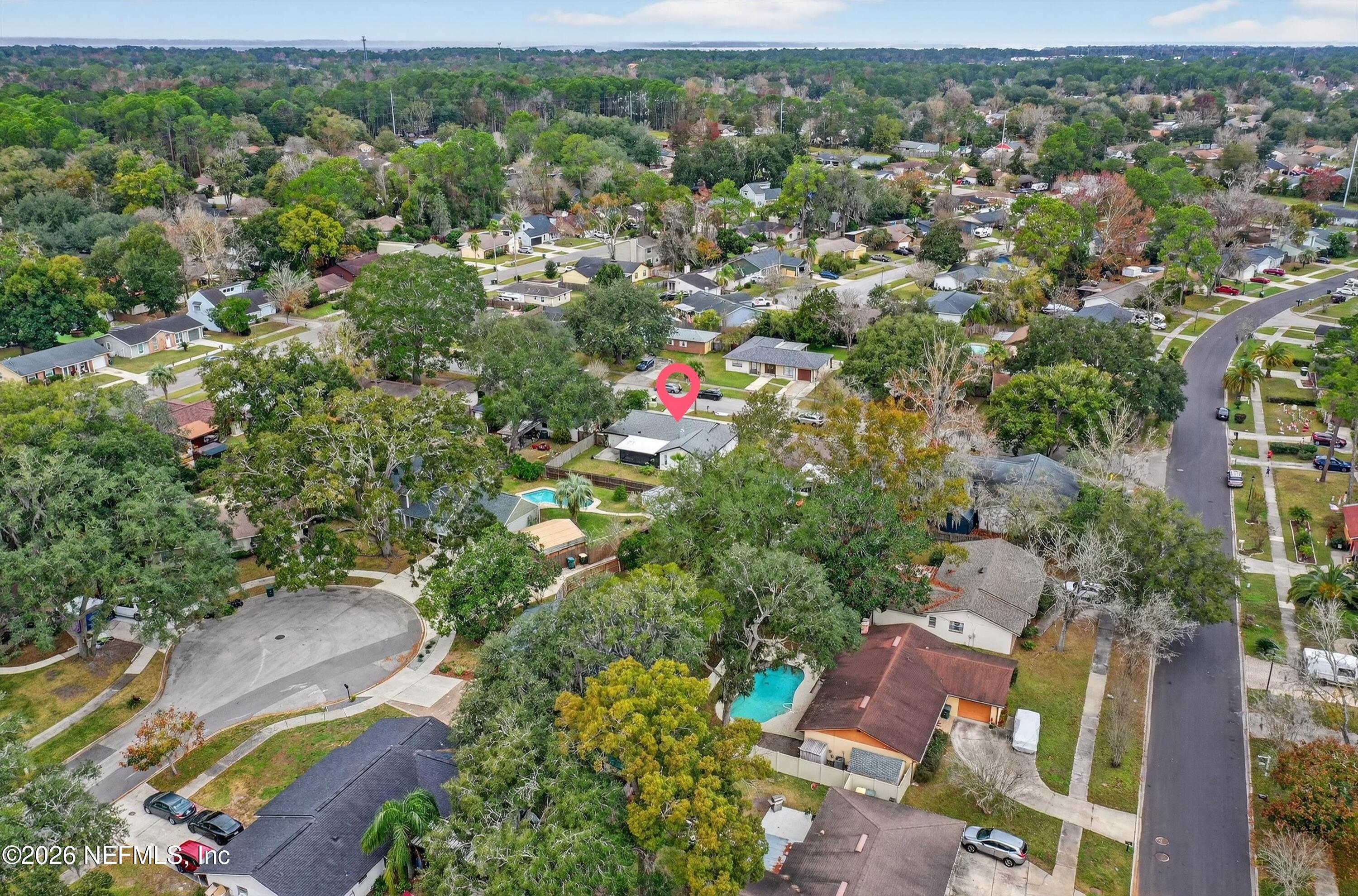 3570 Grassy Ride Drive Jacksonville, FL 32223 - Photo 45 of 51 an aerial view of residential house with outdoor space and trees all around
