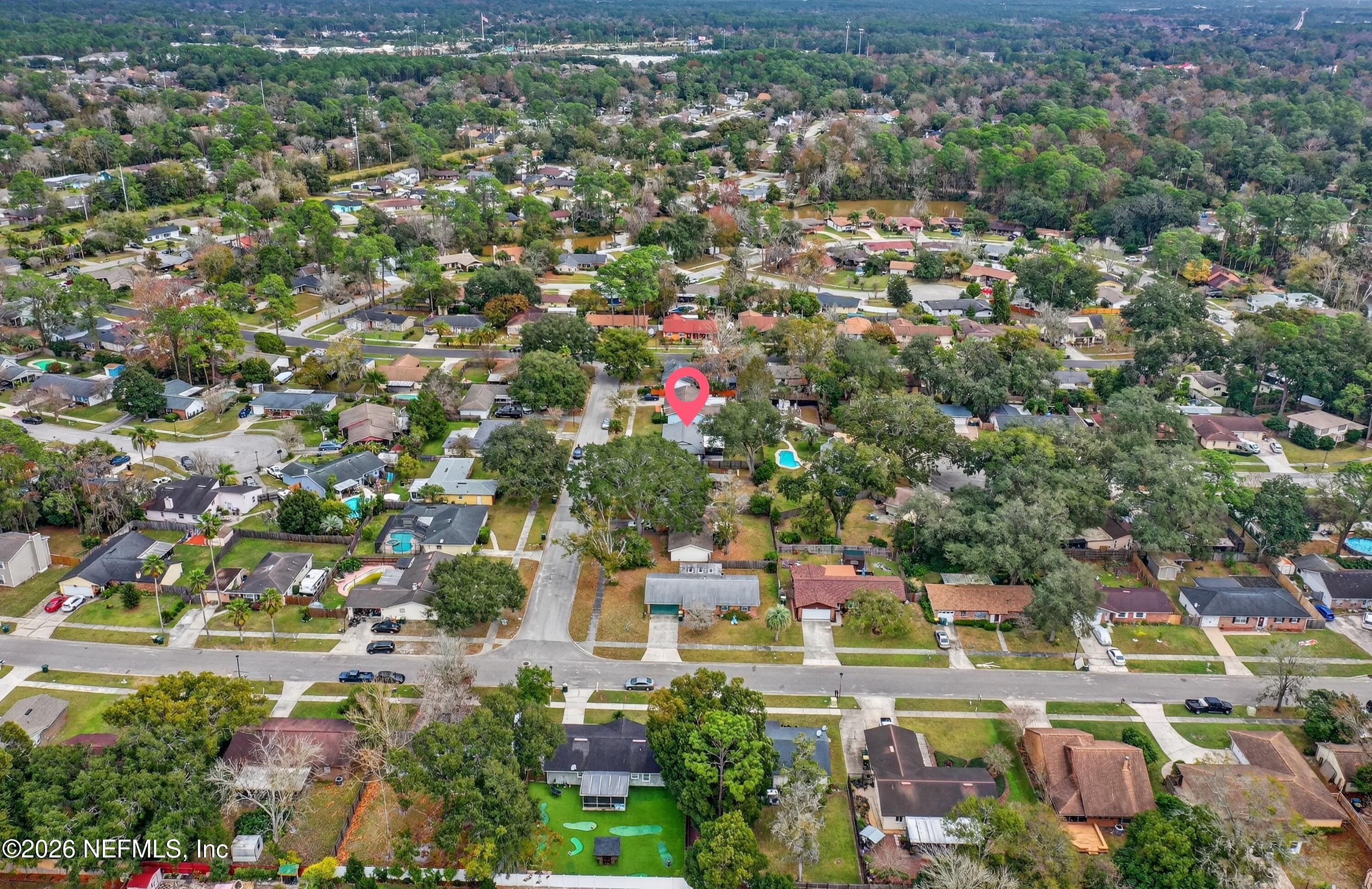 3570 Grassy Ride Drive Jacksonville, FL 32223 - Photo 48 of 51 an aerial view of residential houses with outdoor space and trees