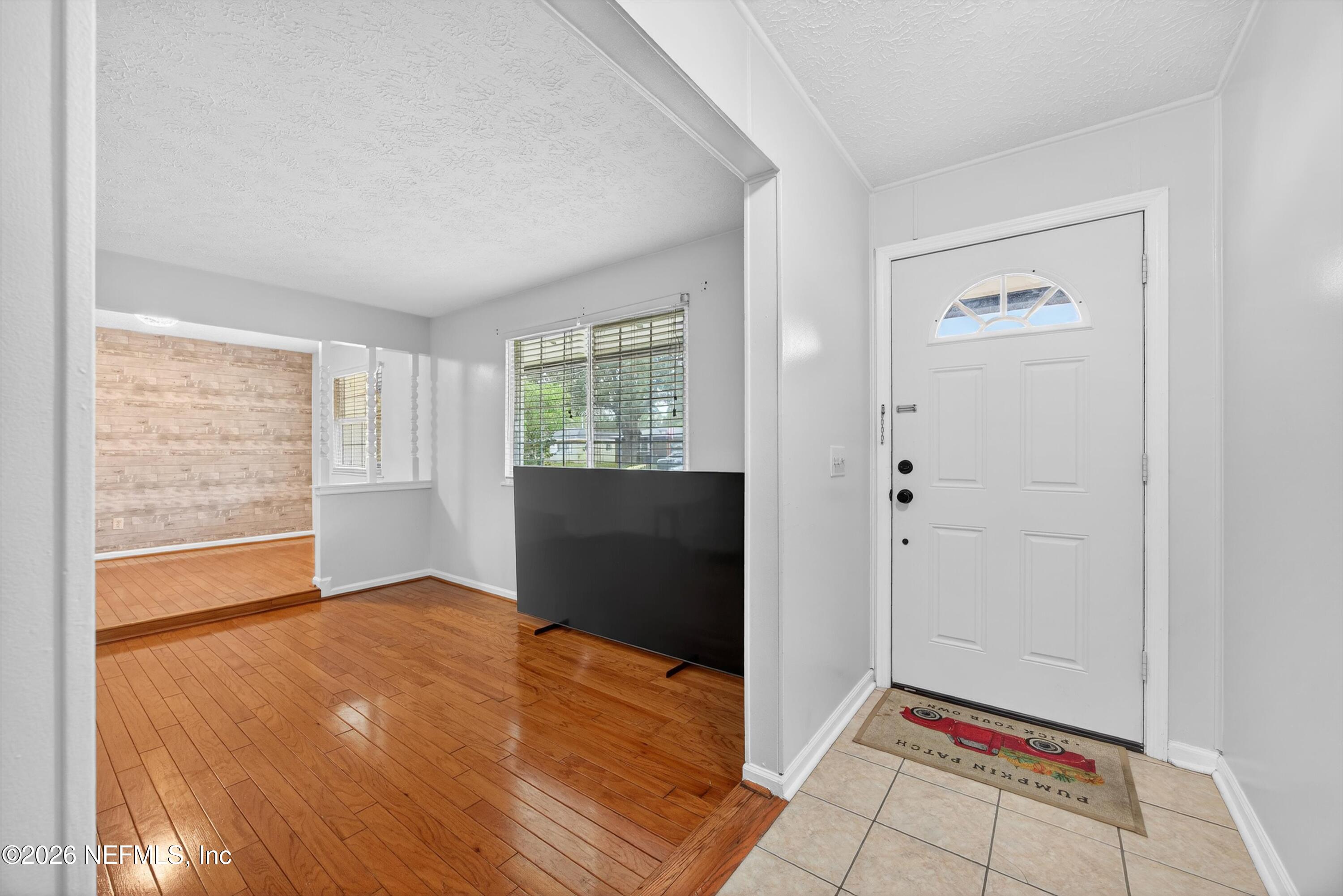 3570 Grassy Ride Drive Jacksonville, FL 32223 - Photo 7 of 51 a view of an empty room and window