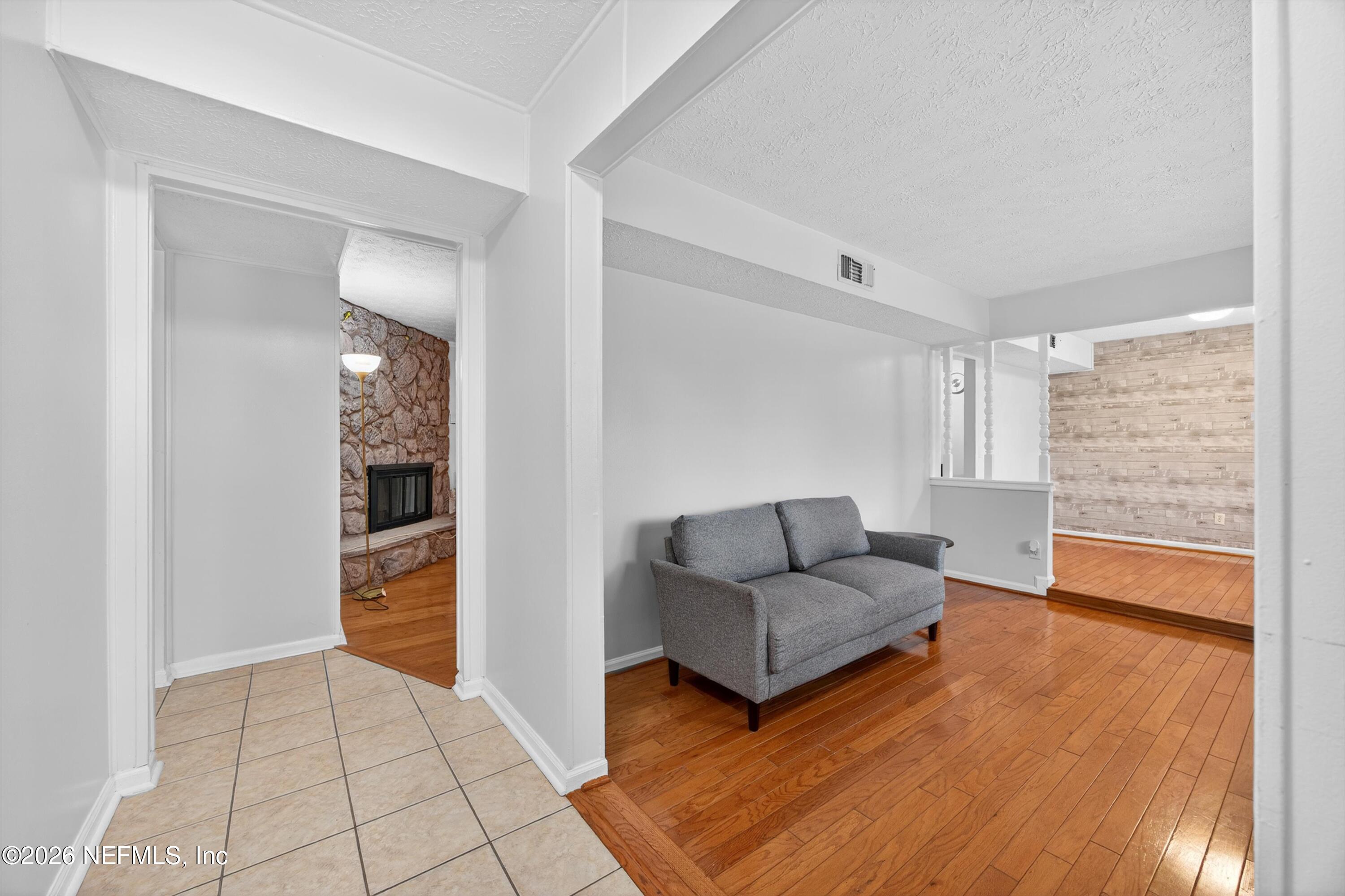 3570 Grassy Ride Drive Jacksonville, FL 32223 - Photo 8 of 51 a living room with furniture and wooden floor