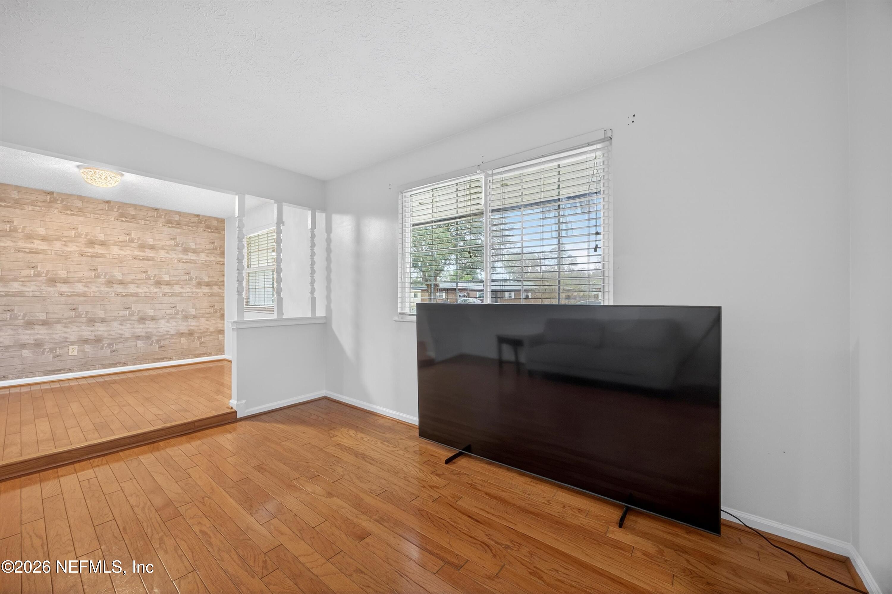 3570 Grassy Ride Drive Jacksonville, FL 32223 - Photo 9 of 51 a view of an empty room with a window