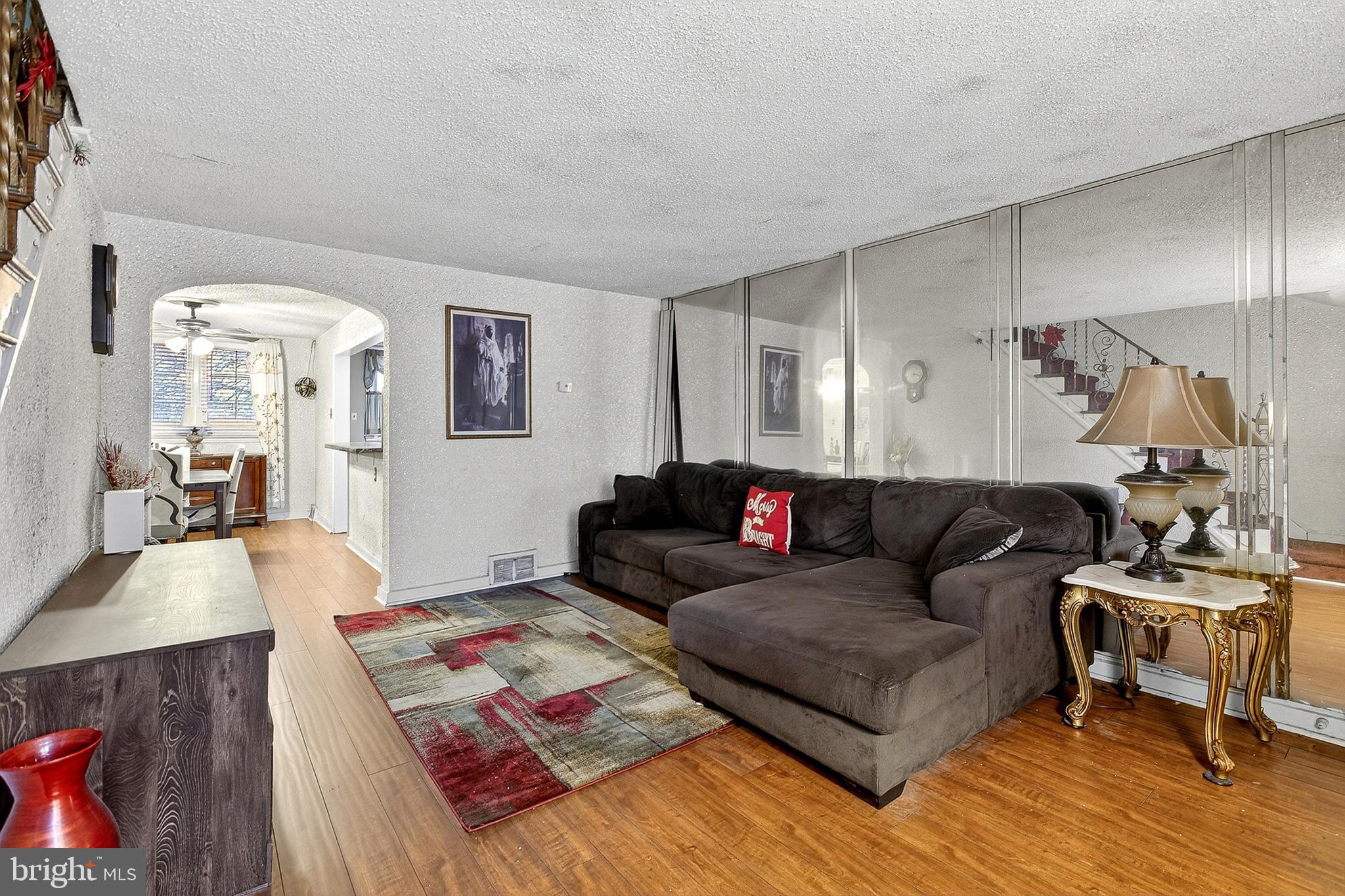 252 North 9th Street Darby, PA 19023 - Photo 6 of 22 a living room with furniture and a rug