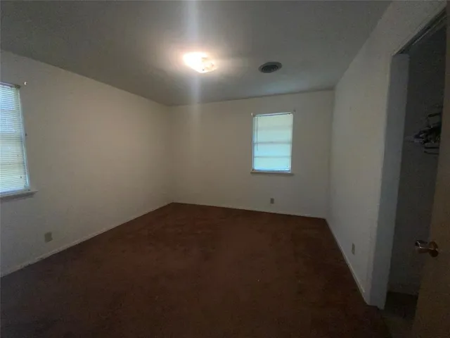 a bathroom with a toilet a sink and bathtub