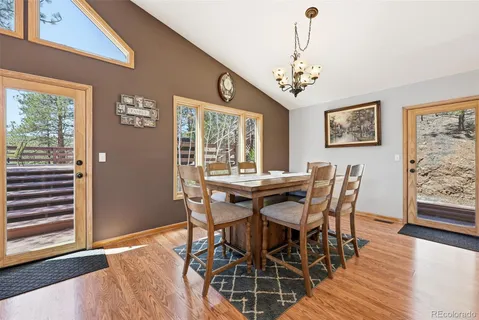 a spacious bathroom with a double vanity sink a mirror and a bathtub