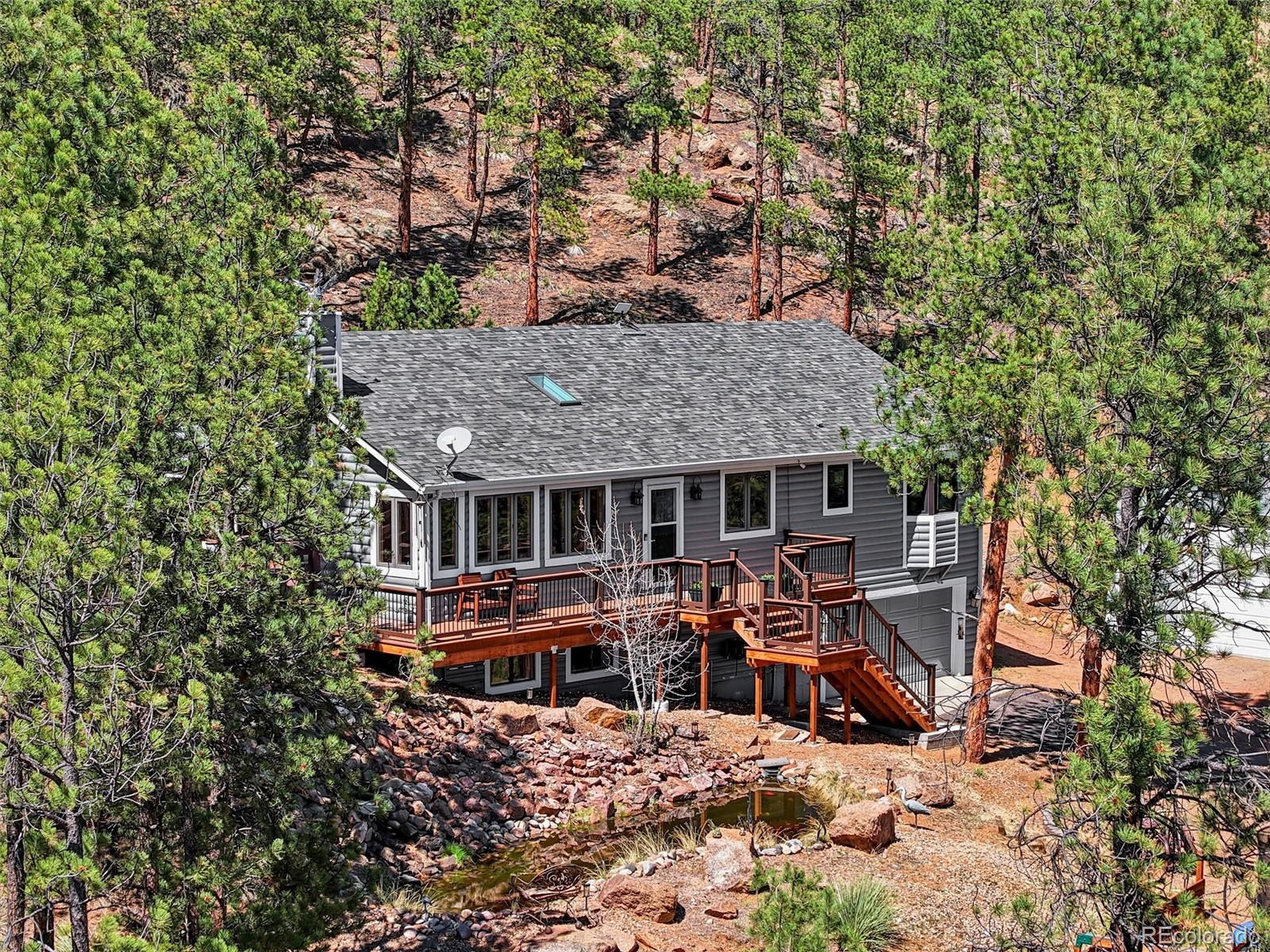 16687 Ouray Road West Pine, CO 80470 - Photo 38 of 49 an outdoor space with seating area