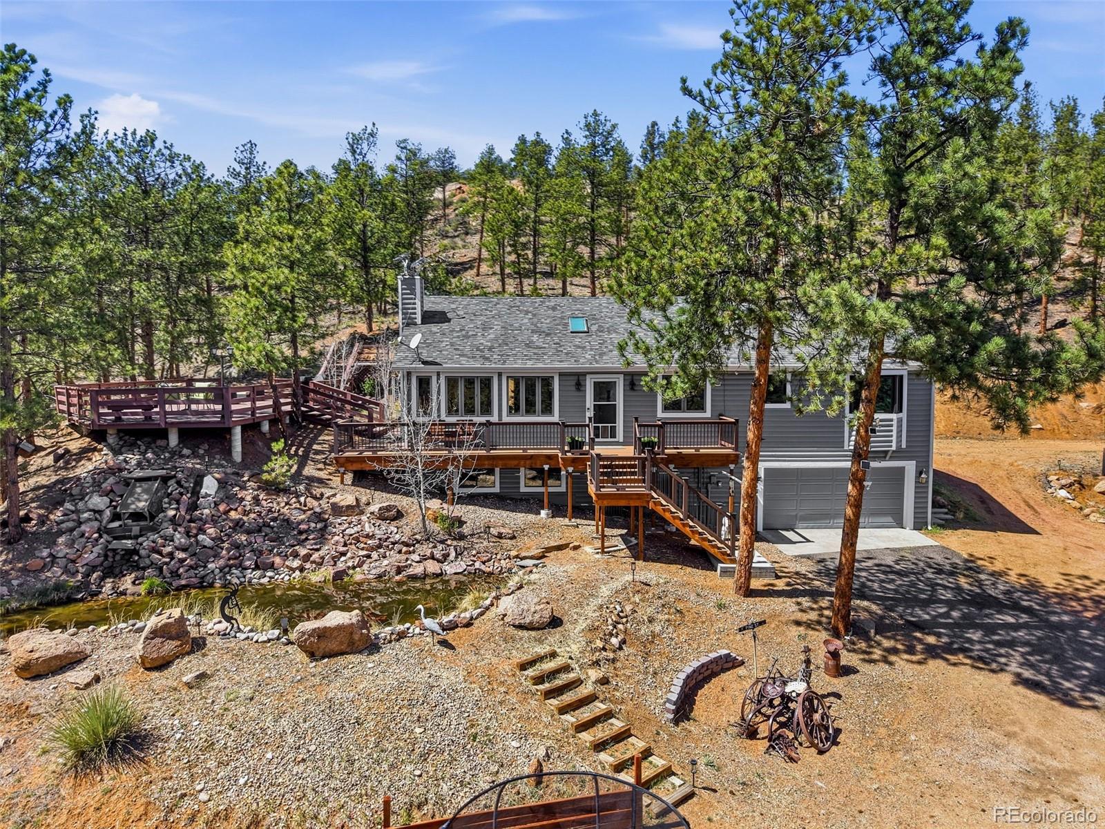 16687 Ouray Road West Pine, CO 80470 - Photo 49 of 49 a view of a chairs and tables in the patio
