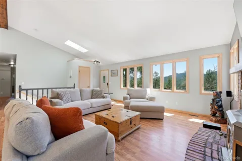 a kitchen with a sink stove top oven and cabinets