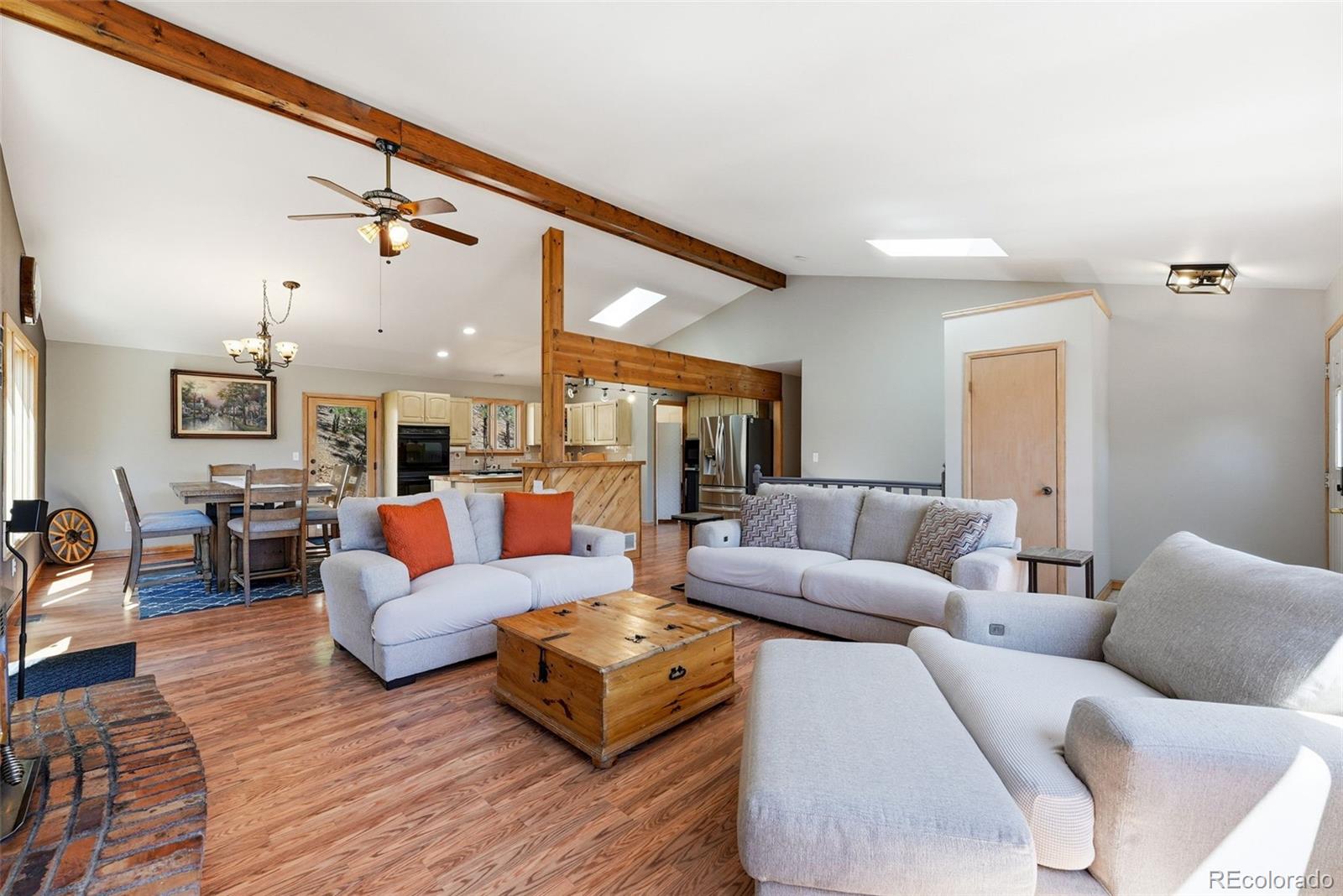 16687 Ouray Road West Pine, CO 80470 - Photo 9 of 49 a living room with furniture and wooden floor