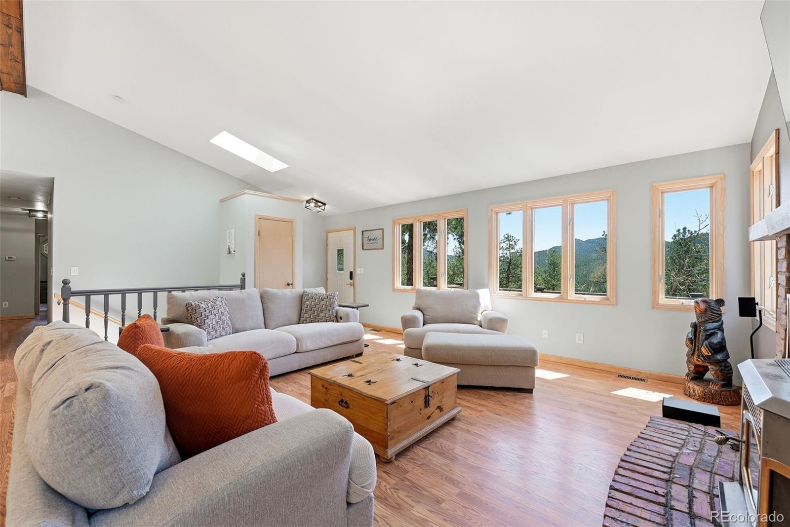 16687 Ouray Road West Pine, CO 80470 - Photo 10 of 49 a living room with furniture and a large window
