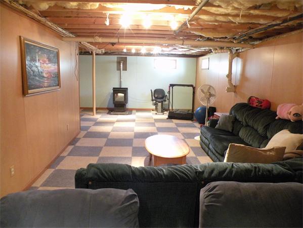 35 Kruse Road Hubbardston, MA 01452 - Photo 23 of 29 a living room with furniture and a glass door