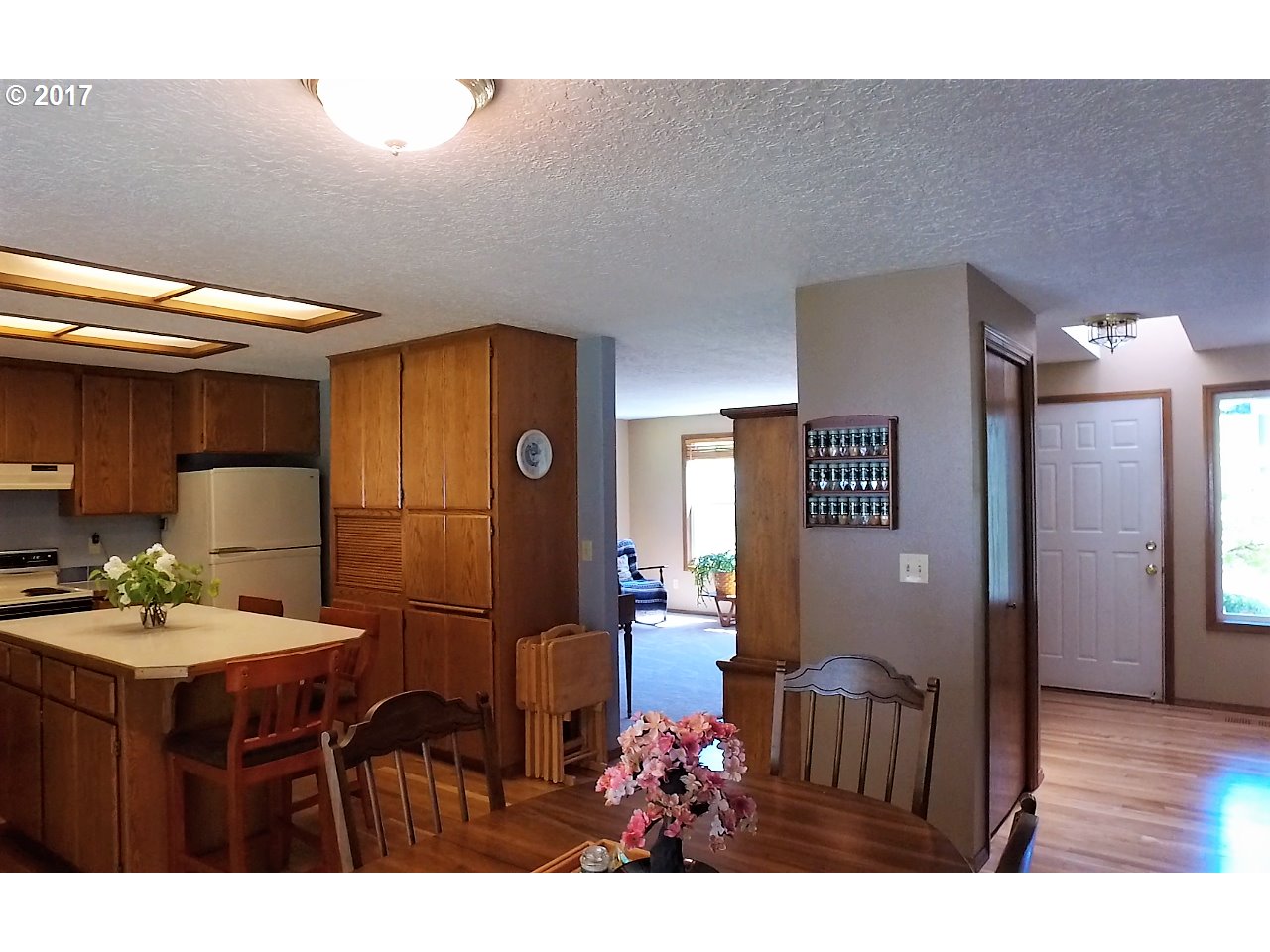 19637 Southeast Heuke Road Damascus, OR 97089 - Photo 5 of 14 a living room with furniture and a table
