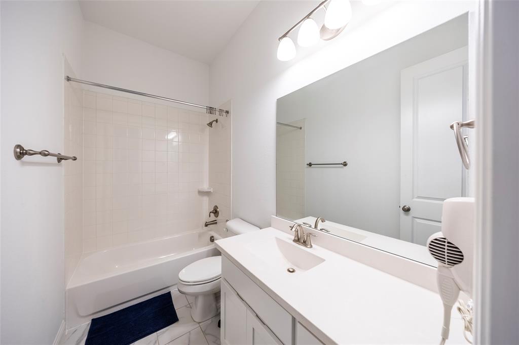 1650 Oakcrest Drive Prosper, TX 75078 - Photo 28 of 40 Full bath featuring shower / washtub combination and vanity