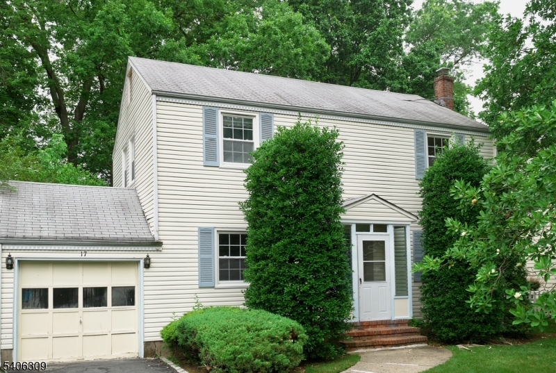 a aerial view of a house with a yard