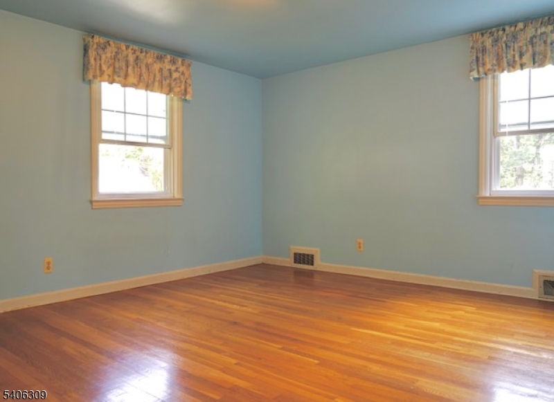 17 Wellington Road Livingston, NJ 07039 - Photo 13 of 20 an empty room with a window