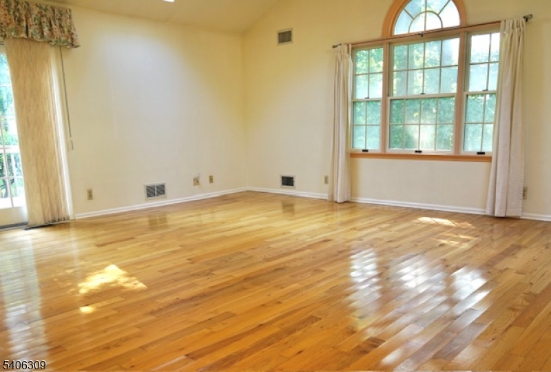 17 Wellington Road Livingston, NJ 07039 - Photo 2 of 20 a view of an empty room with a window