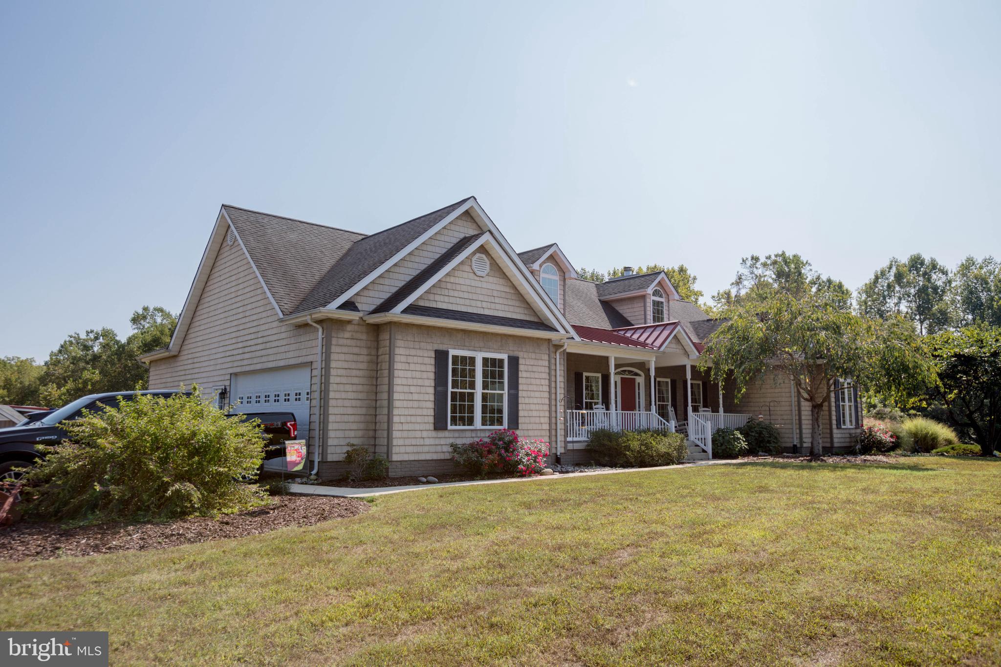 7295 Flint Hill Road Owings, MD 20736 - Photo 24 of 39 front view of a house with a yard