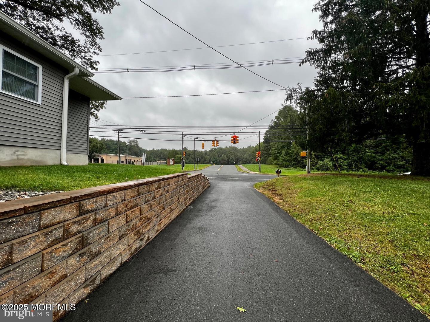 1253 Yardville Allentown Road, Unit 2 Allentown, NJ 08501 - Photo 12 of 12 a view of a pathway with a yard