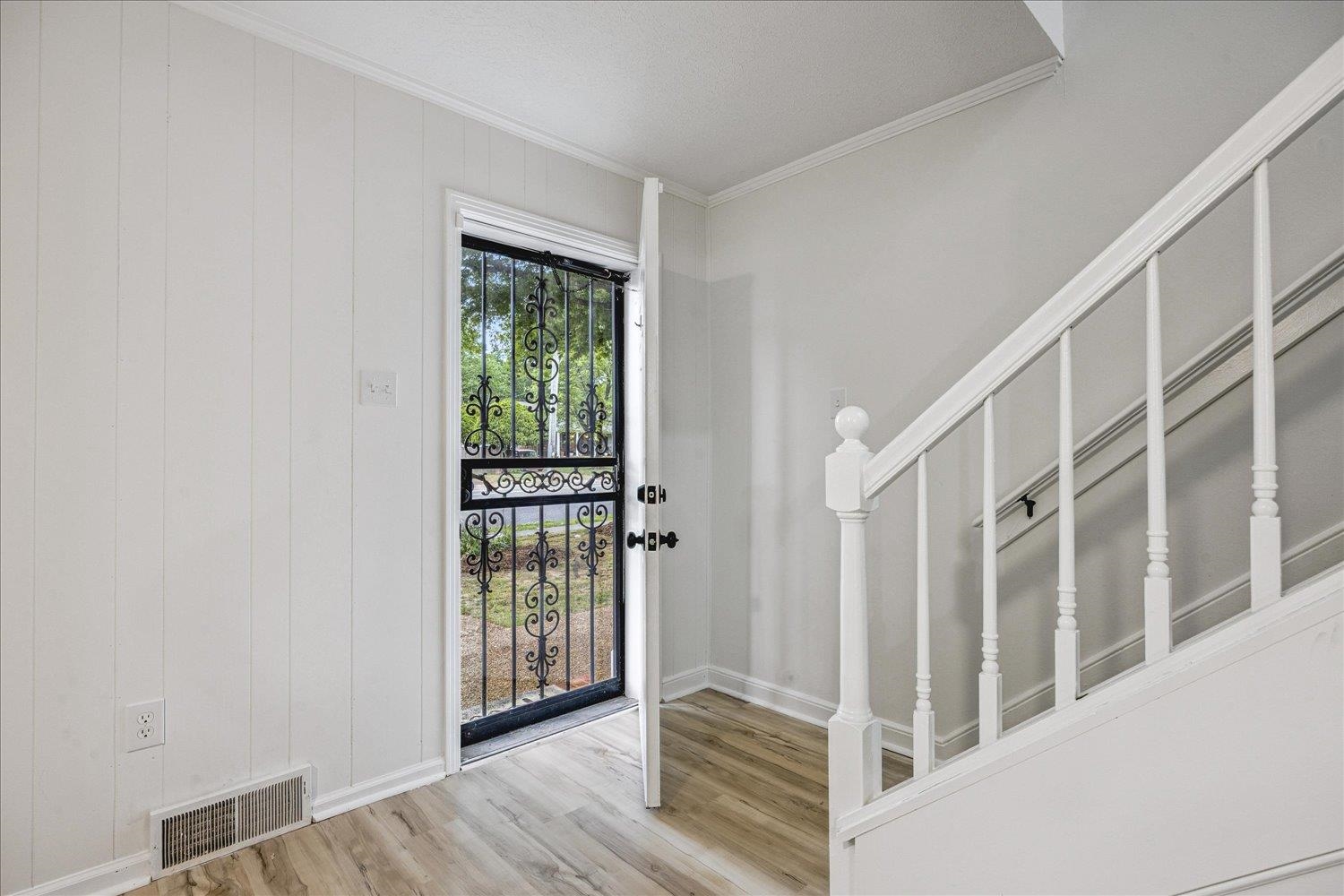 6137 Quince Road Memphis, TN 38119 - Photo 3 of 19 Entrance foyer featuring ornamental molding and light wood finished floors