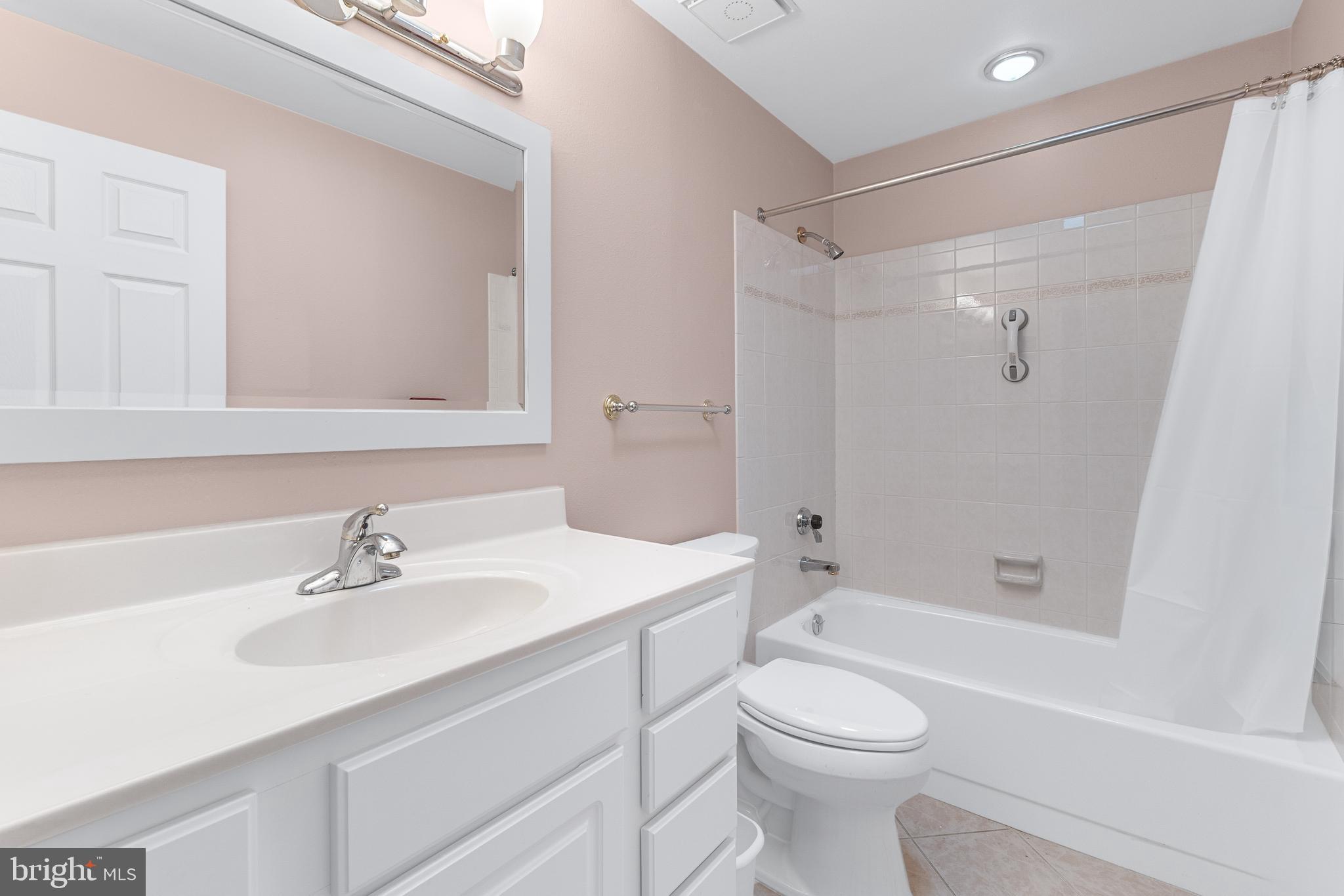 15400 Short Ridge Court, Unit 42A Silver Spring, MD 20906 - Photo 18 of 24 a bathroom with a sink toilet and shower