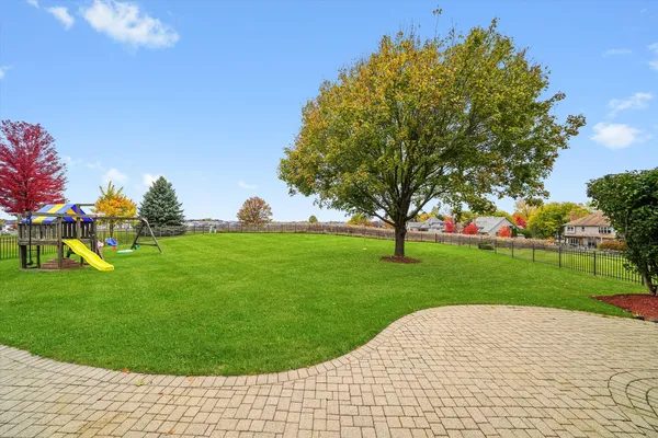 a view of a park with large trees