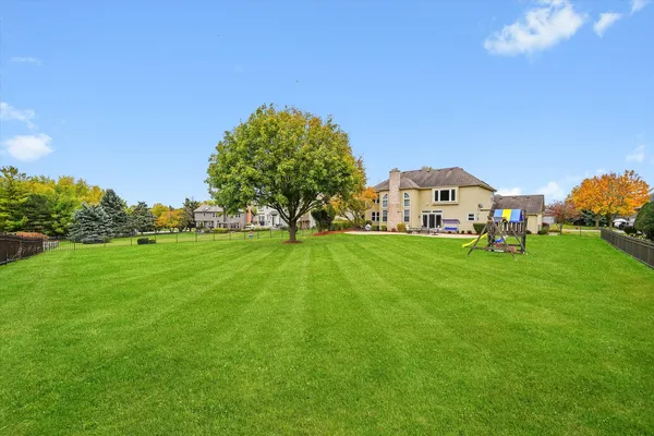 a view of a house with a big yard