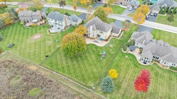 an aerial view of residential house with outdoor space
