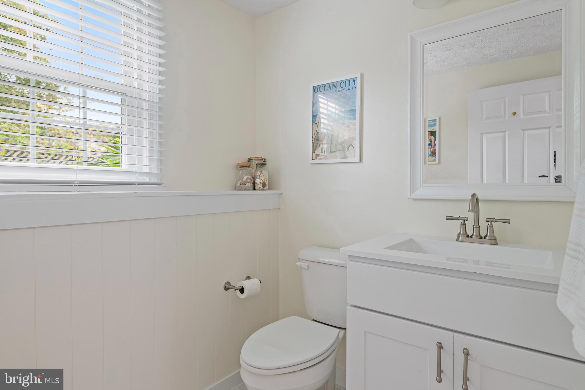 333 Brunswick Place Riva, MD 21140 - Photo 32 of 60 a bathroom with a sink toilet vanity and window