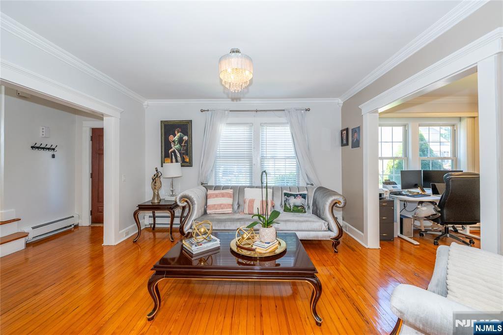 690 Garden Street Maywood, NJ 07607 - Photo 7 of 49 a living room with furniture and a large window