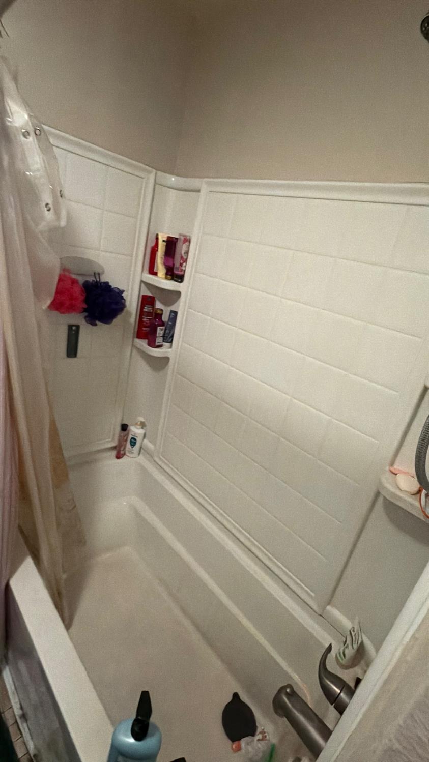 6140 Marwick Way Carmichael, CA 95608 - Photo 13 of 17 a bathroom with a shower