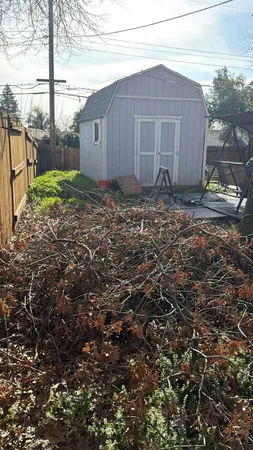 a house view with a backyard space