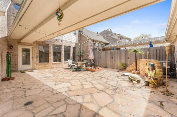 a view of a house with snow on the floor