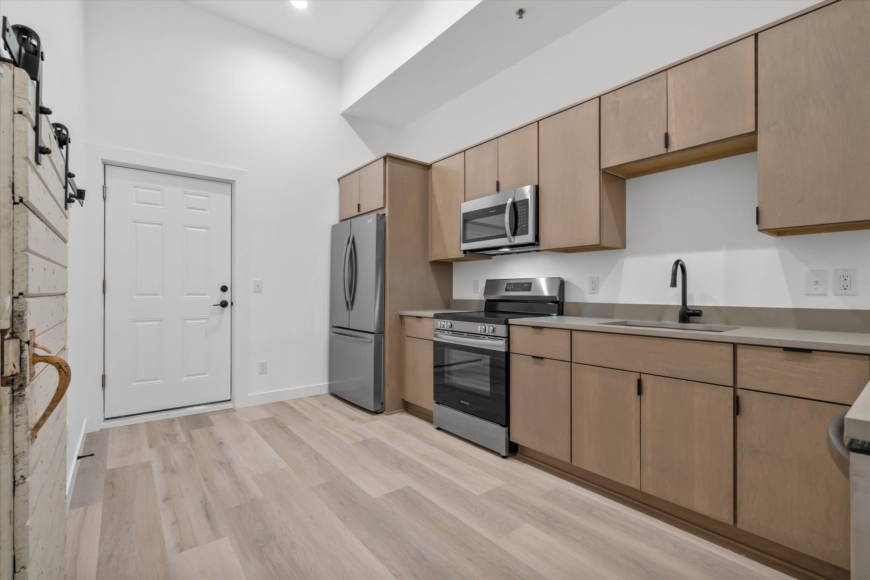 308 Oak Street Slinger, WI 53086 - Photo 30 of 39 Lower 1 Bdrm w/den