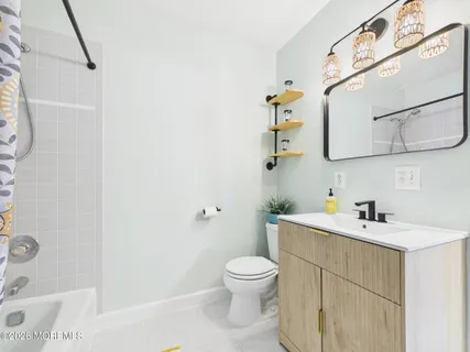 a close up of a wall with a shower curtain