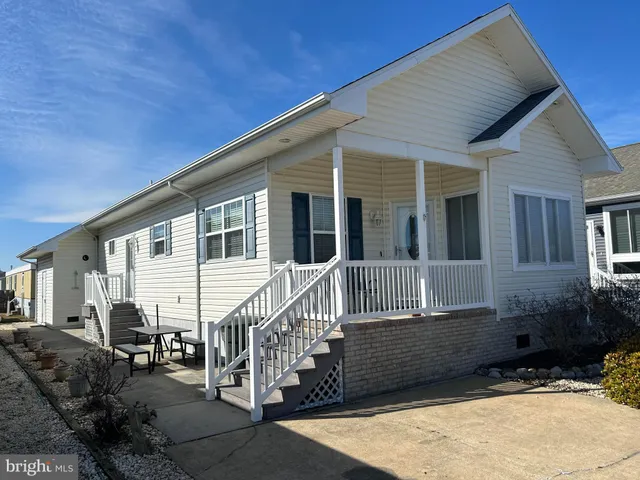 a front view of a house with a balcony