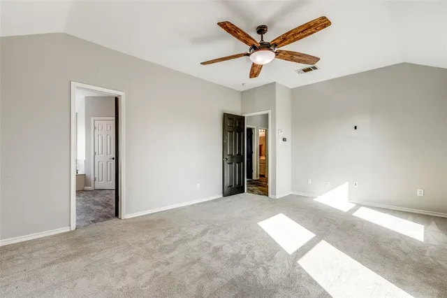 a view of a livingroom with a ceiling fan