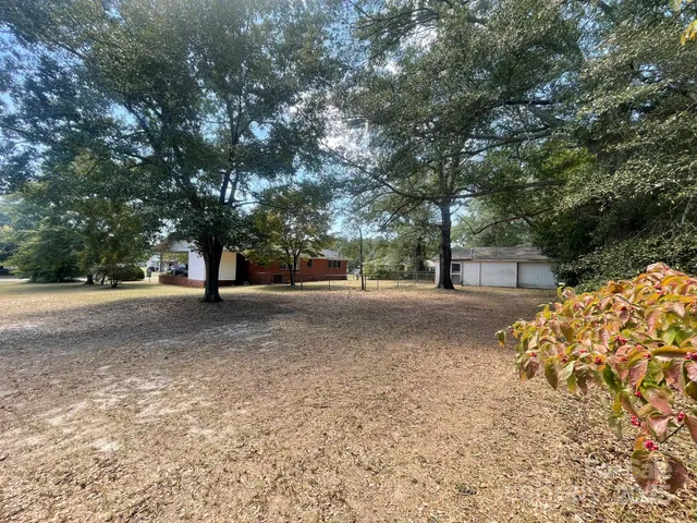 a view of road with trees