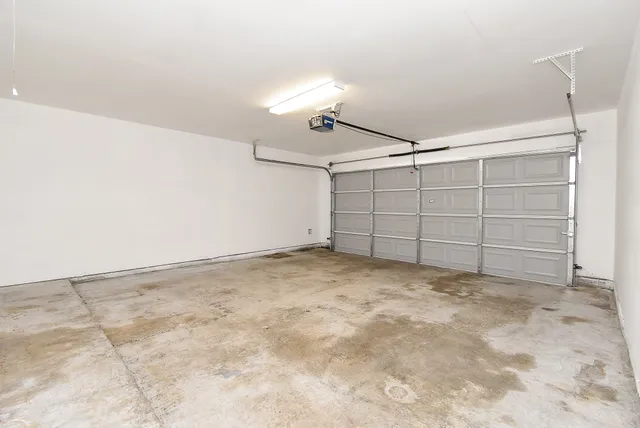 a view of a backyard with large trees