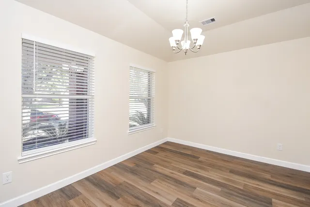 a picture of a bench in a bathroom