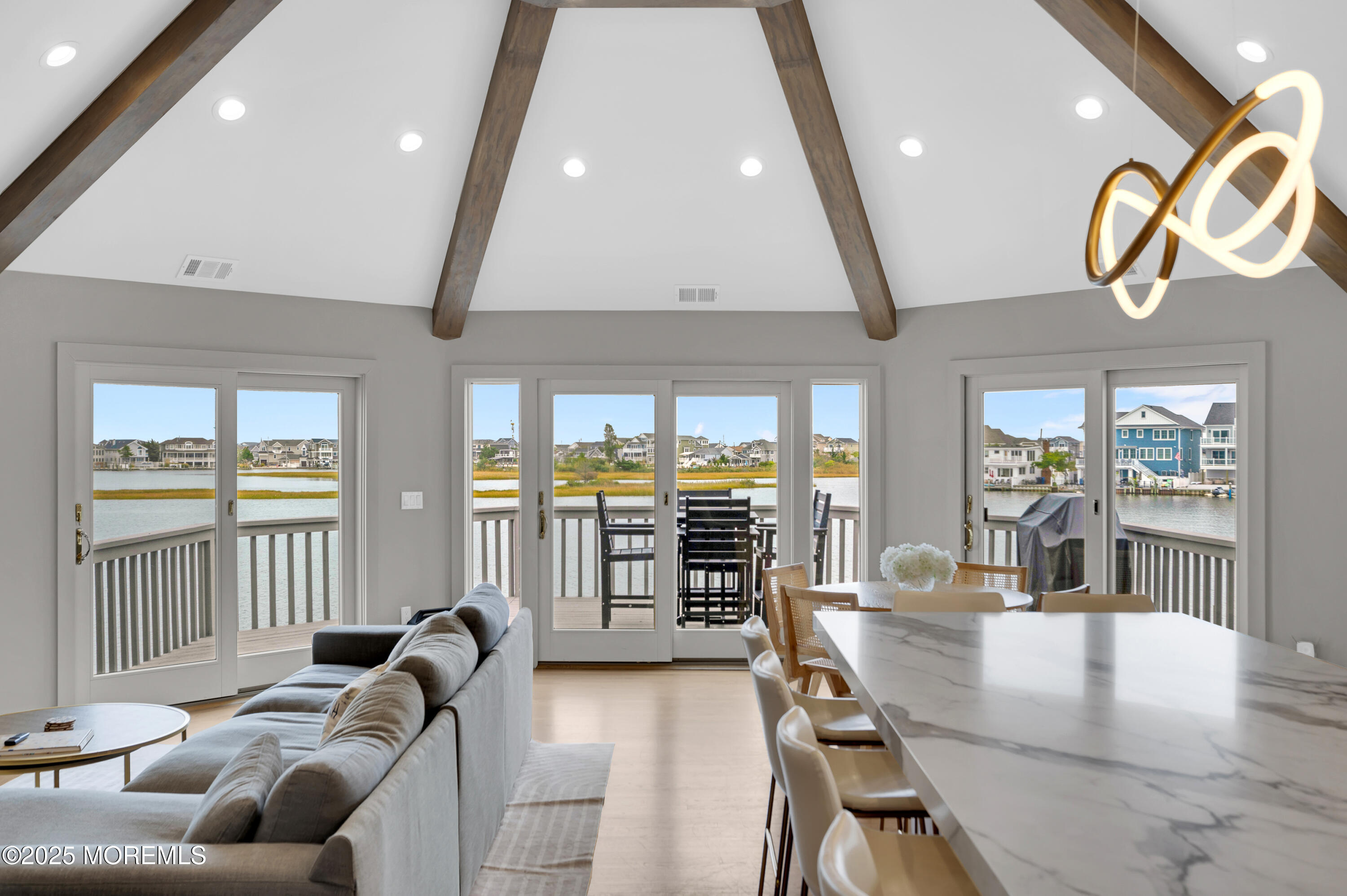 28 Harborside Drive East Seaside Heights, NJ 08751 - Photo 12 of 34 a living room with furniture and a large window