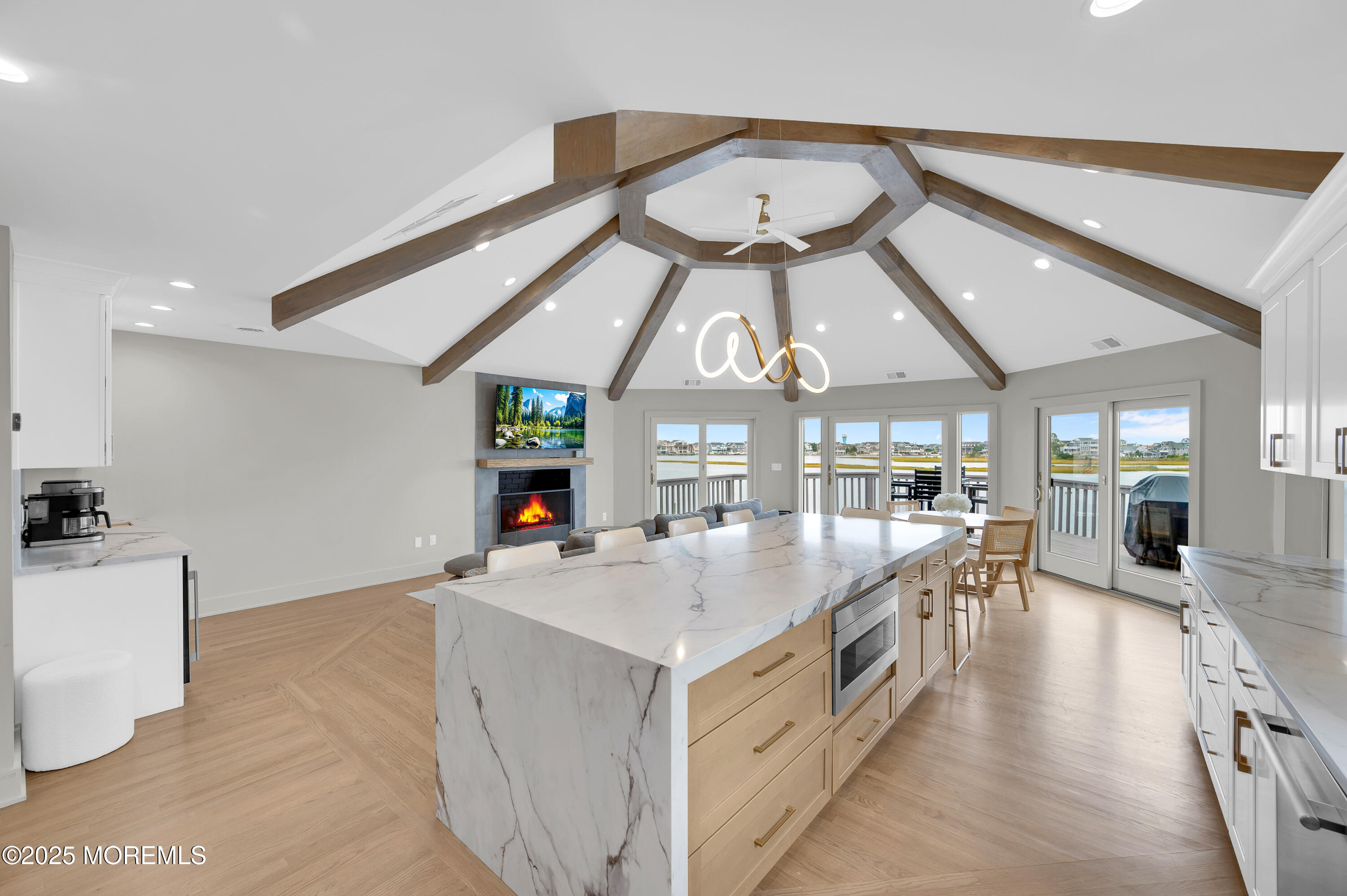 28 Harborside Drive East Seaside Heights, NJ 08751 - Photo 5 of 34 a large white kitchen with a large window