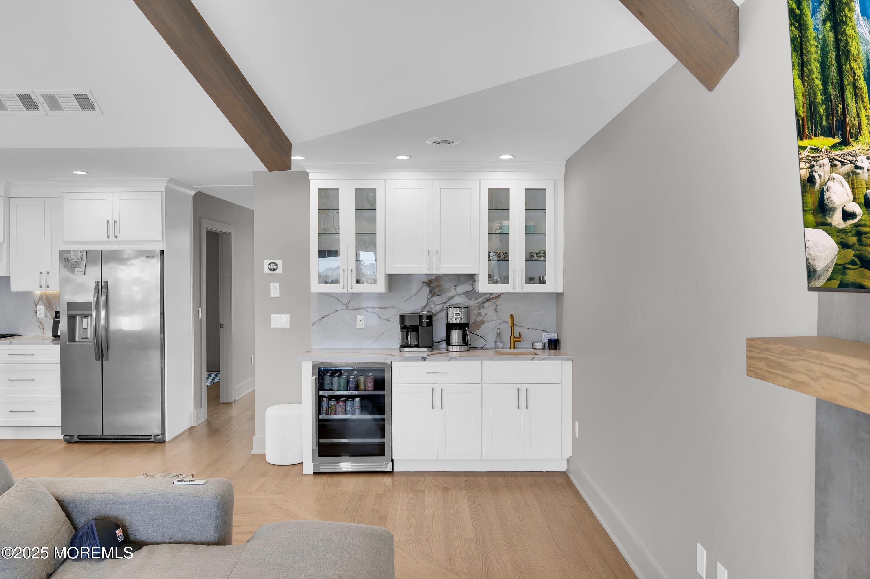 28 Harborside Drive East Seaside Heights, NJ 08751 - Photo 7 of 34 a kitchen with stainless steel appliances a refrigerator sink and stove