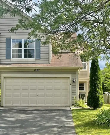 a view of a house with a swimming pool