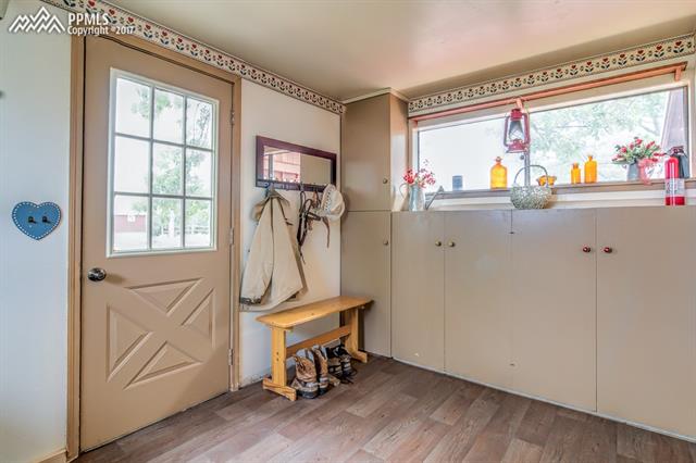 37655 Truckton Road Yoder, CO 80864 - Photo 5 of 27 Traditional Mud/Laundry Room! With Lots of Natural Sunlight and Storage! NEW FLOORING!