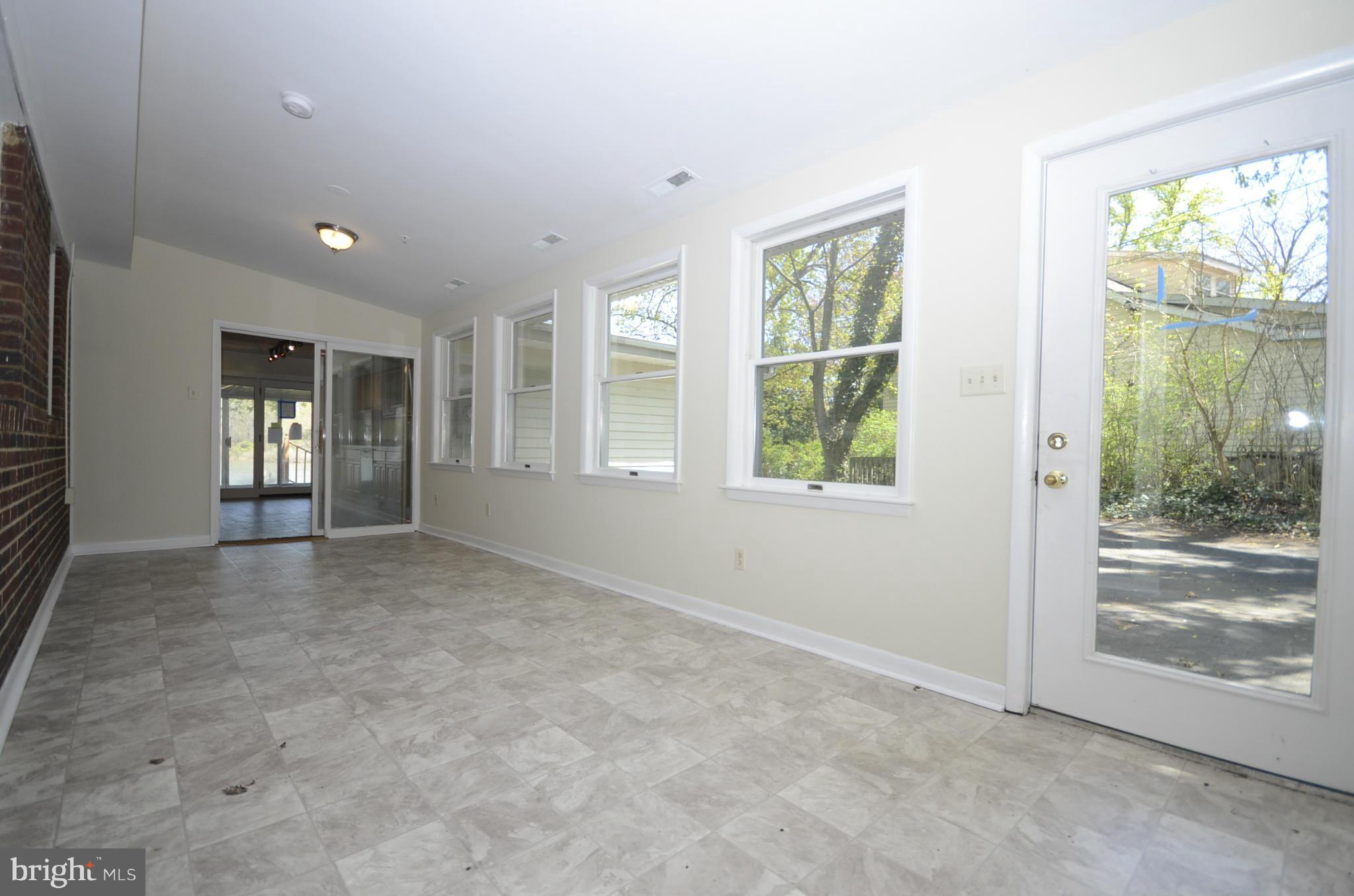 7841 North Cove Road Baltimore, MD 21219 - Photo 13 of 14 BEAUTIFUL SUNROOM