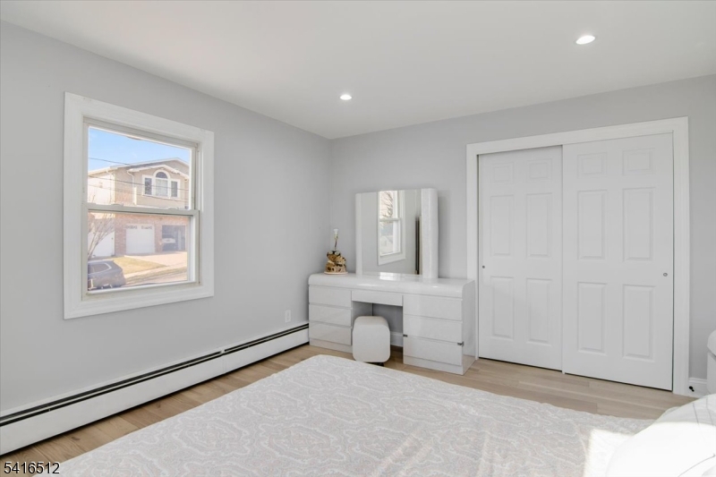 565 Center Street Wood-Ridge, NJ 07075 - Photo 11 of 26 a view of an empty room with a window