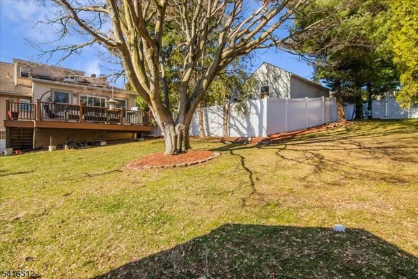 a view of swimming pool with a yard