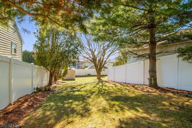 565 Center Street Wood-Ridge, NJ 07075 - Photo 23 of 26 a view of backyard of house