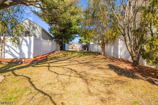 a view of backyard of a house