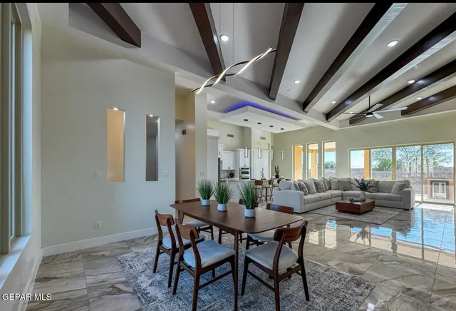 a view of a dining room with furniture
