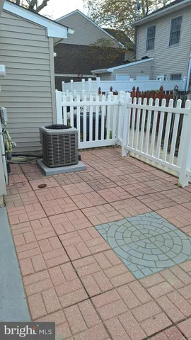 a view of a deck with furniture